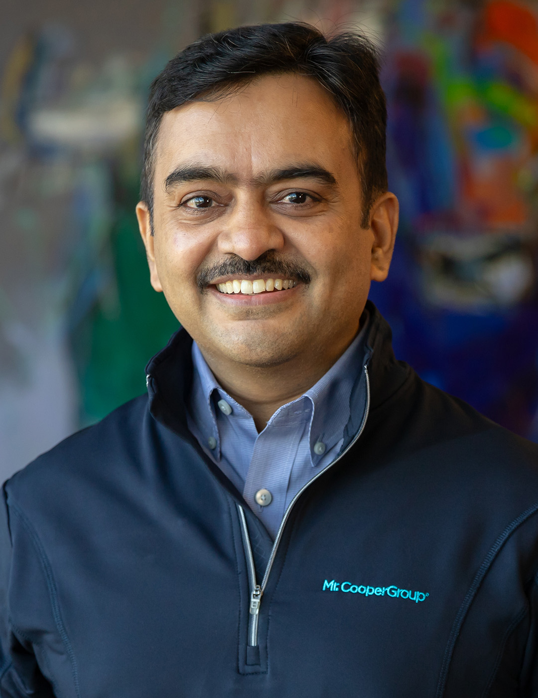 Headshot of Chief Innovation and Digital Officer - man smiling